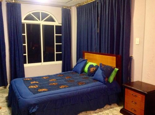 Katil atau katil-katil dalam bilik di Hostal Mirador de Otavalo