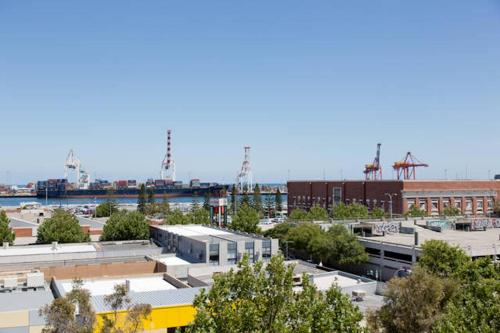 an aerial view of a city with a harbor at Ocean Harbour Views in Fremantle