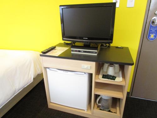 TV a/nebo společenská místnost v ubytování Smile Hotel Utsunomiya Higashiguchi