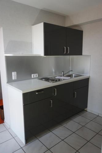 Kuchyň nebo kuchyňský kout v ubytování Haus Delphin