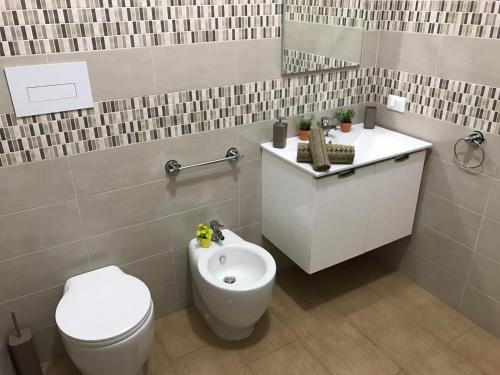 Kúpeľňa v ubytovaní Dammusi Gold - Salvo