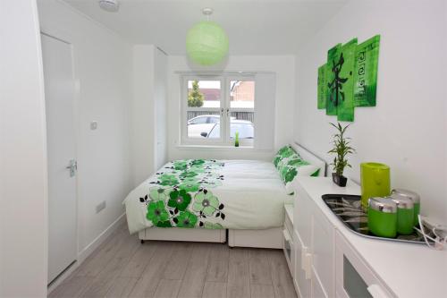 Postel nebo postele na pokoji v ubytování Gala Rooms Homestay - Free Parking