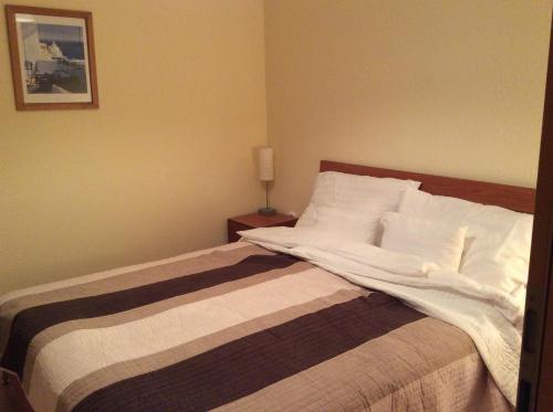 Posteľ alebo postele v izbe v ubytovaní Rehab Apartment