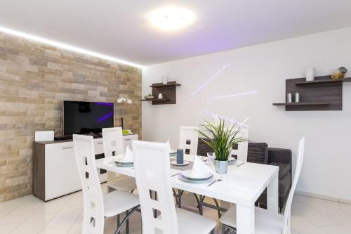 Dapur atau dapur kecil di Sea Sound Apartments Rea