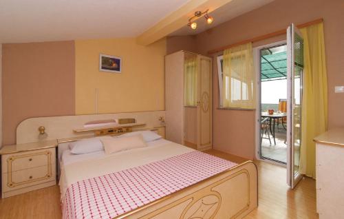 Cama o camas de una habitación en Apartments Otok