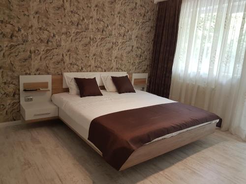 Una cama o camas en una habitación de Apartament Verde