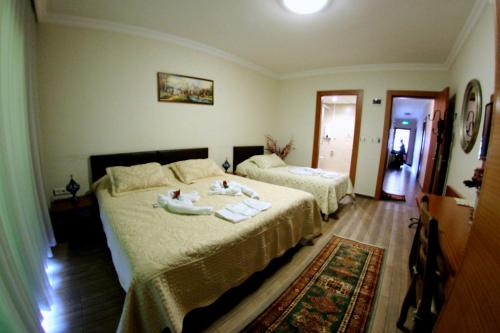 Cama o camas de una habitación en Selena Hotel
