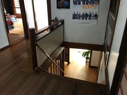 a view of a staircase in a house at Niko Ryokan in Aizuwakamatsu