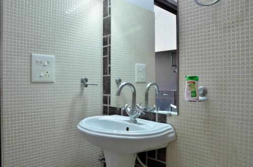 Um banheiro em Shivansh Inn Resort