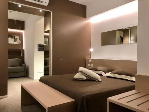 Postel nebo postele na pokoji v ubytování Hotel Palme