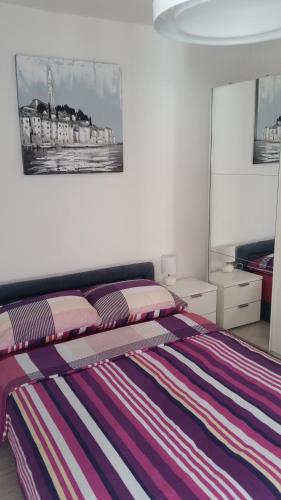 Katil atau katil-katil dalam bilik di Apartments Villa Nona II