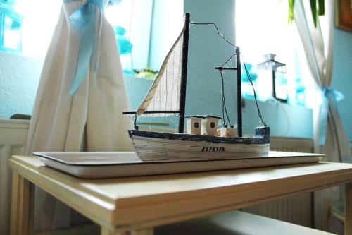 a model boat sitting on top of a table at Best view small house free parking self check-in in Budapest
