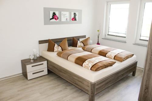 a bedroom with two beds in a room at Haus Feriendomizil in Ahlbeck