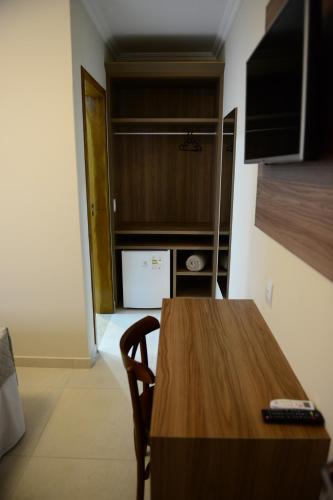 Μια τηλεόραση ή/και κέντρο ψυχαγωγίας στο Pousada Recanto do Mar