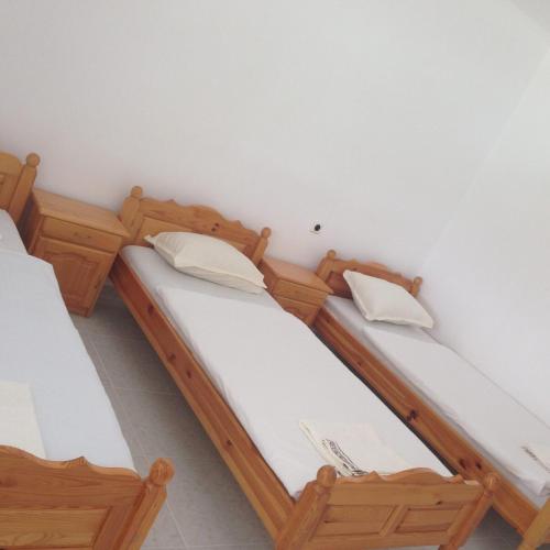 Postel nebo postele na pokoji v ubytování Хотел Сандим
