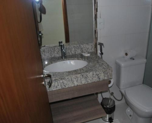 Ванная комната в Riviera Park - 2 Quartos - Achei Ferias