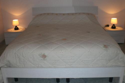 Cama o camas de una habitación en Villino Monte San Michele