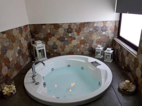 Ett badrum på Etna Suite Group