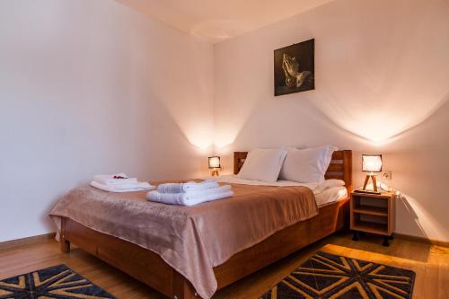 Postel nebo postele na pokoji v ubytování Casa ARBO