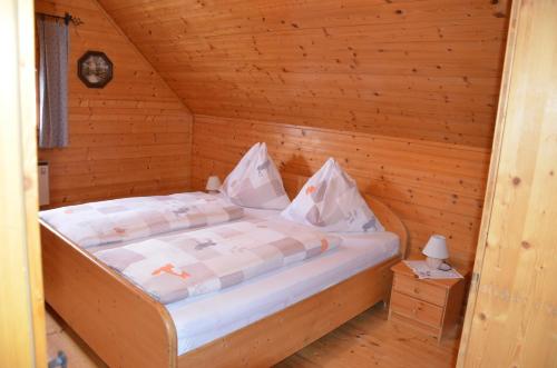 Postel nebo postele na pokoji v ubytování Ferienhaus Anna
