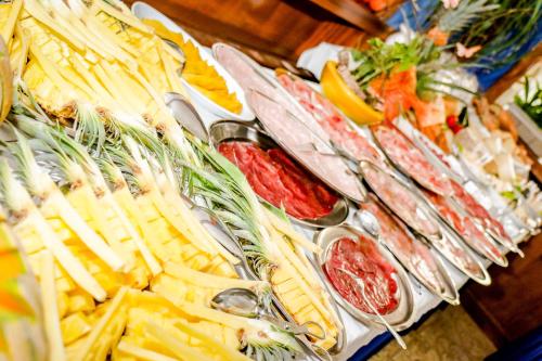 a bunch of different types of food on a table at Hotel Cristallo in Riolo Terme