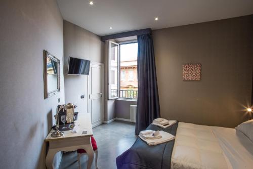 A bed or beds in a room at Roma 2B