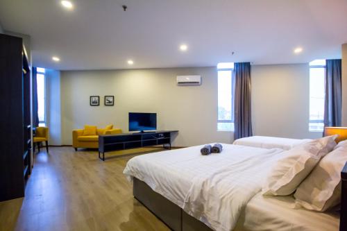 Postel nebo postele na pokoji v ubytování OMG Hotel