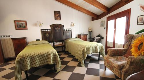 En eller flere senge i et værelse på Albergo Santo Spirito