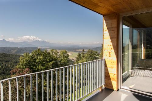 a balcony with a view of the mountains at Südalpen Lofts in Bleiburg