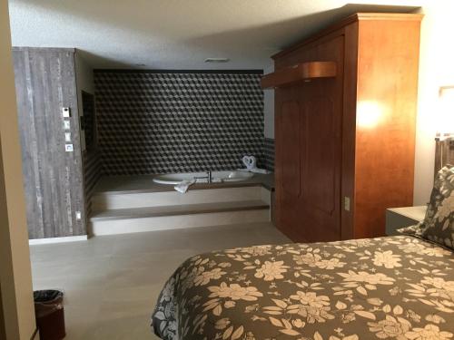 Postel nebo postele na pokoji v ubytování Amosphère Complexe