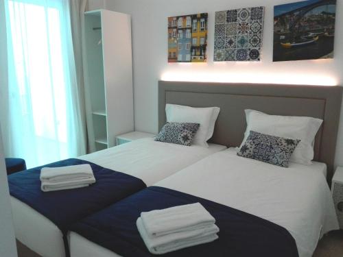 Postelja oz. postelje v sobi nastanitve BRA.com Apartments Oporto Campanhã