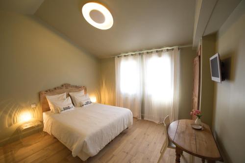 Postel nebo postele na pokoji v ubytování Chambre d'Hôtes Arima