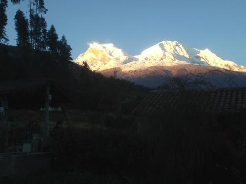 a view of a mountain with snow on it at La Casita de mi Abuela in Mancos