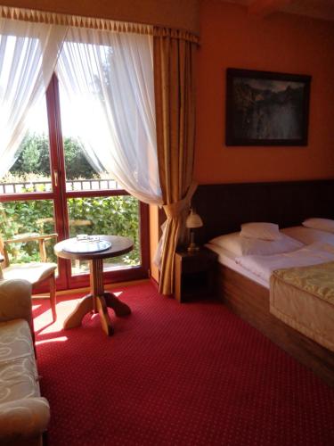 Postel nebo postele na pokoji v ubytování Villa Bialka & Spa