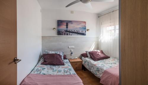 Postel nebo postele na pokoji v ubytování Apartamento en Salou