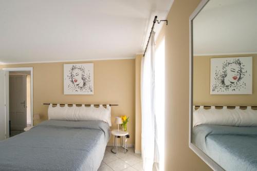 Postel nebo postele na pokoji v ubytování La Fiorana Ivrea