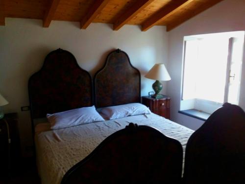 A bed or beds in a room at Country House in Portofino Mount & Natural Park