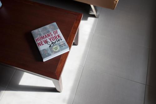 a book sitting on top of a wooden table at La Copa Inn Beach Hotel in South Padre Island