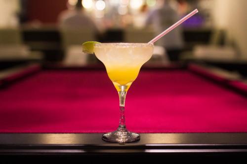 a drink with a lime on a table at La Copa Inn Beach Hotel in South Padre Island