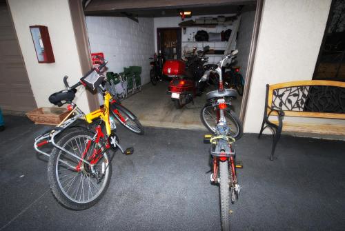 a group of bikes parked in a garage at Rivergate Mountain Lodge in Pigeon Forge