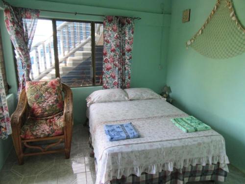 Voodi või voodid majutusasutuse Villy's Cottage toas
