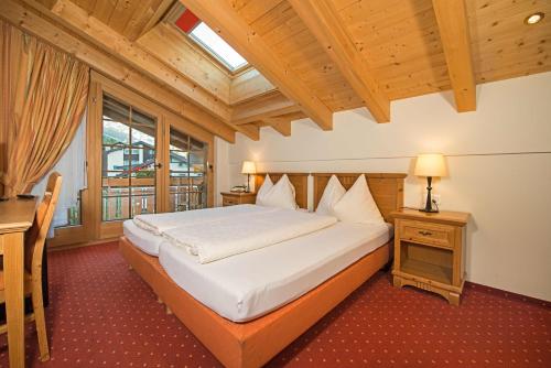 Lova arba lovos apgyvendinimo įstaigoje Hotel Dufour Chalet - Adults only