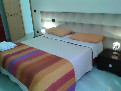 Tempat tidur dalam kamar di I Gelsomini