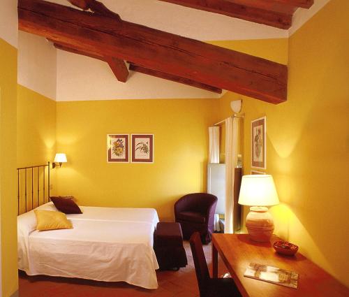Ένα ή περισσότερα κρεβάτια σε δωμάτιο στο Villa Ducci