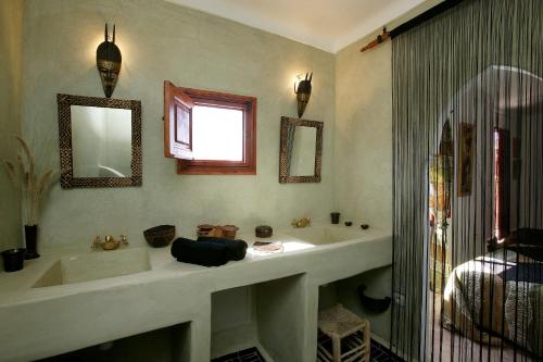 Koupelna v ubytování Les Jardins Mandaline
