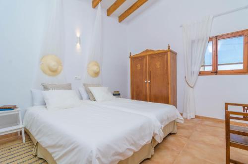 Ένα ή περισσότερα κρεβάτια σε δωμάτιο στο Torre Marina