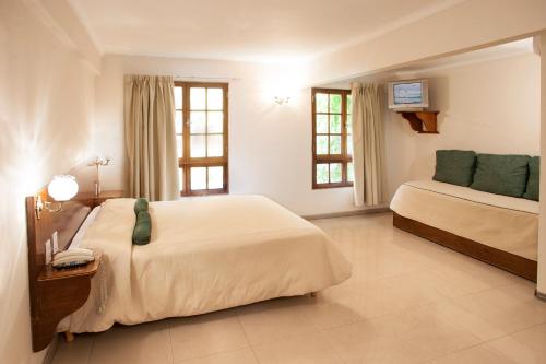 Cama ou camas em um quarto em Hotel Princess
