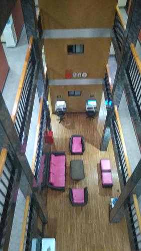an overhead view of a room with chairs and tables at Hotel H - Valencia Adults Only in Mexico City