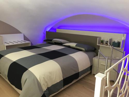 Postel nebo postele na pokoji v ubytování OroVerde Rooms & Suite nel cuore di Trani