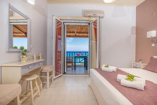 Posteľ alebo postele v izbe v ubytovaní Blue House Apartments